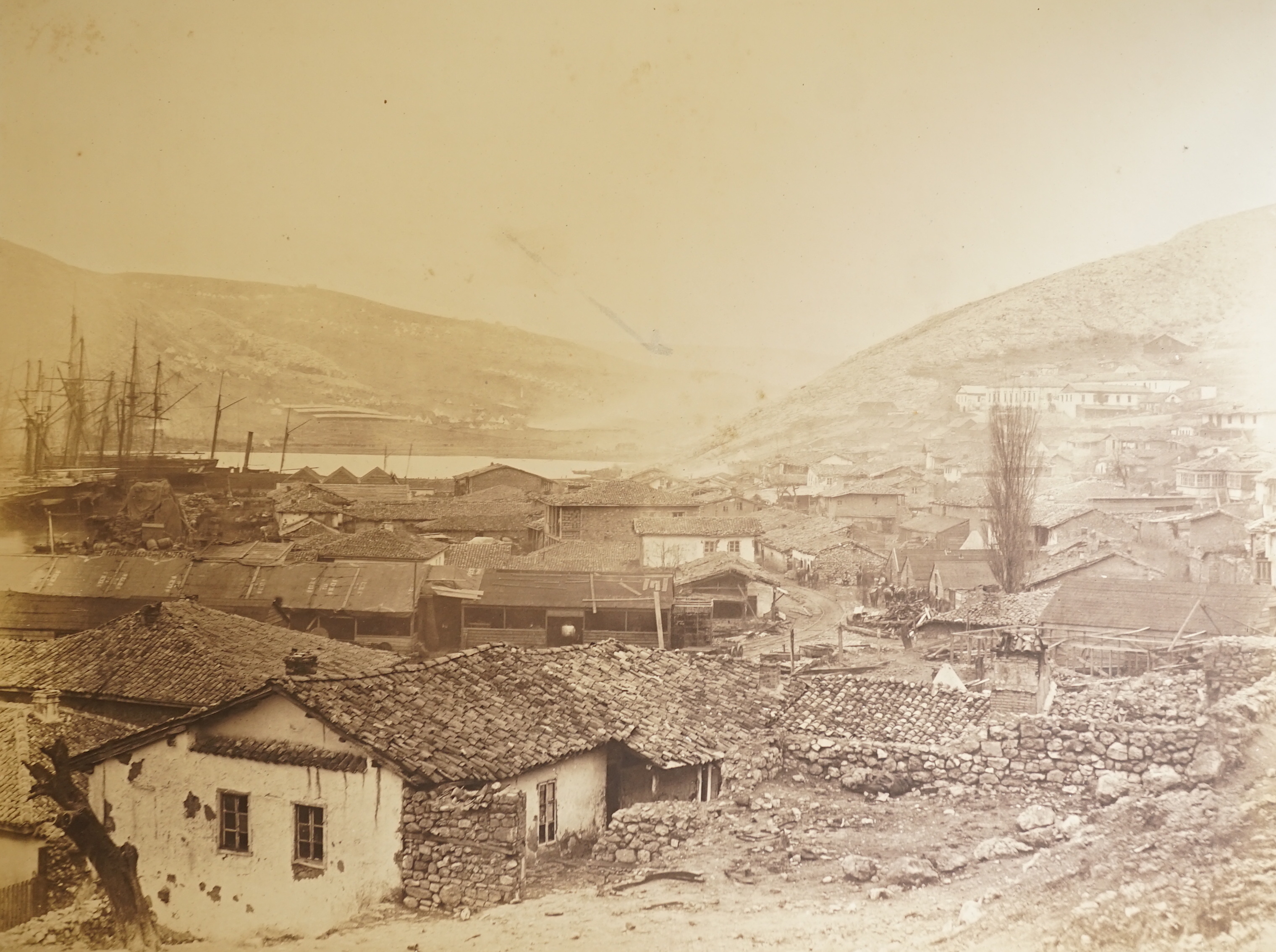 Roger Fenton (1819-1869), two black and white photographs, Views from the Crimea: 'General view of Balaclava, 1856', and 'The Tomb of the Generals on Cahearts Hill', 27 x 35.5cm and 22 x 33cm, one unframed